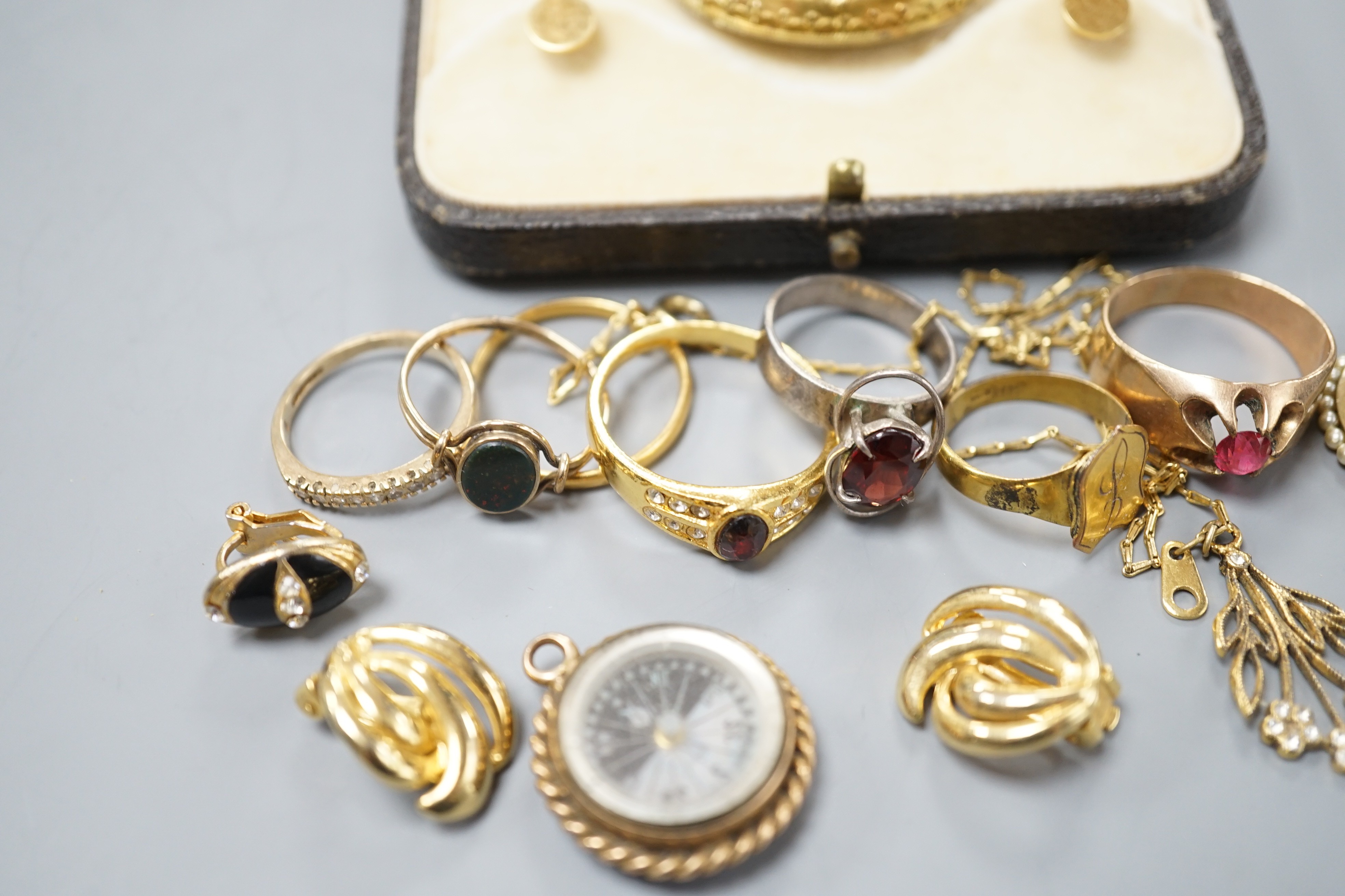 A 22ct gold wedding band 2.3 grams, a Victorian yellow metal and gem set oval brooch and other jewellery